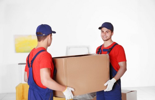 Packed boxes and furniture ready for house removals
