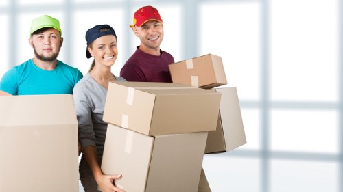 Packed boxes and furniture ready for local removals