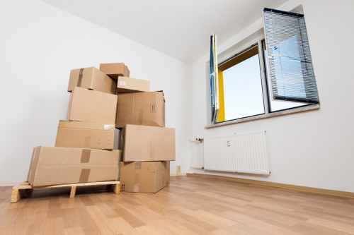 Packed household items ready for a load-based moving quote