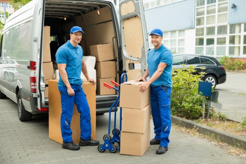 Van loading furniture in a residential Stjohnswood street