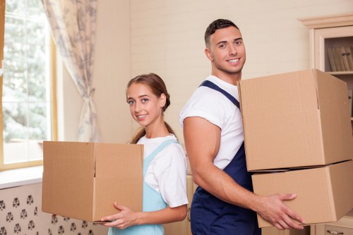 Packed household boxes and furniture ready for transport