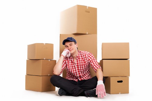 Packed office equipment ready for a business move in Stjohnswood